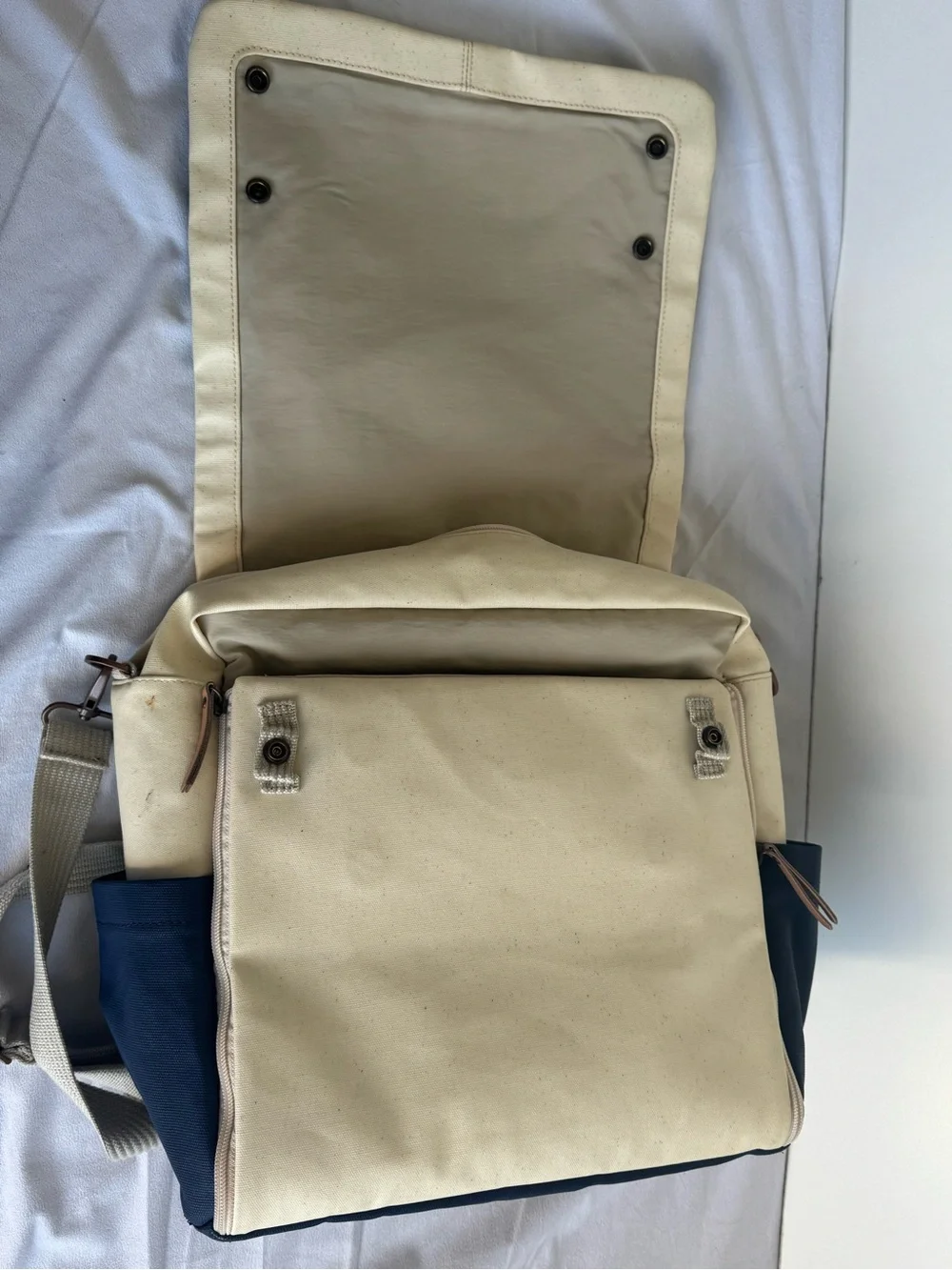 Petunia Pickle Bottom Boxy Backpack Diaper Bag in a geometric cream, navy, teal